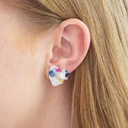 resin heart studs in ear
