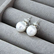 pearl stud earrings in jewelry box