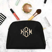 black nylon travel bag with makeup