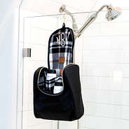nylon toiletry kit hanging in bathroom