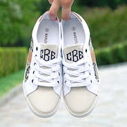 white lace snakeskin sneakers with black monogram