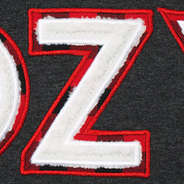 close up of sherpa letters with buffalo plaid