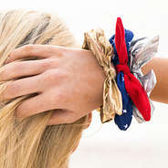 bow scrunchies on arm