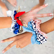 multiple scrunchies on arms