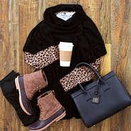 black short sleeve cowl neck poncho with duck boots and leopard top
