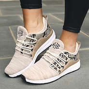 monogrammed snakeskin sneakers with leggings