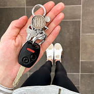 monogrammed three ring keychain in hand