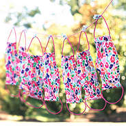 leopard print face masks on clothes line