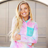 detail of monogrammed tie dye sherpa pullover