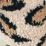close up of fuzzy leopard socks