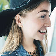 gold bar earrings with fall floppy hat