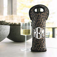 leopard monogrammed wine bag with wine glass on porch