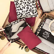 eclipse leopard packing bag set in suitcase
