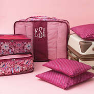 Burgundy Woodland Blossom packing bag set on pink