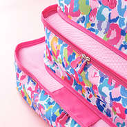 watercolor cheetah packing bag set stacked up close