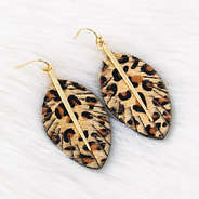 leopard feather earrings on faux fur