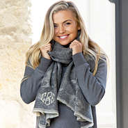 Close up of faded camo scarf on blonde girl