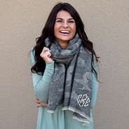 monogrammed soft faded camo scarf with sage tunic and riding boots