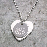 detail of monogram on layered heart necklace