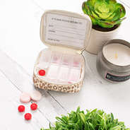 ivory metallic leopard pill box open