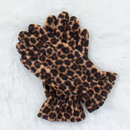 leopard gloves on fuzzy rug