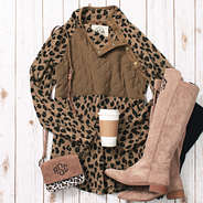 leopard print asymmetrical snap pullover with riding boots and crossbody