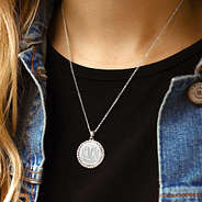 silver monogrammed rhinestone disc necklace with jean jacket