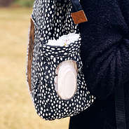 pocket detail of black dot diaper backpack