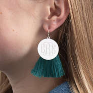 silver and teal monogrammed fringe disc earrings in ear