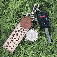 spring leopard key fob in grass