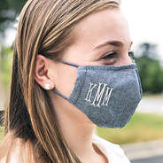 girl wearing monogrammed face mask