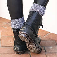 back of black leopard bottom duck boots