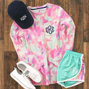 terry monogrammed tie dye sweatshirt with running shorts outfit
