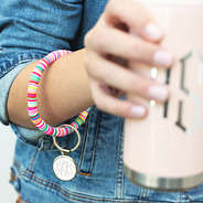 monogrammed beaded key ring on arm