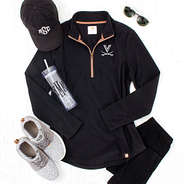 uva fleece pullover in black with sneakers