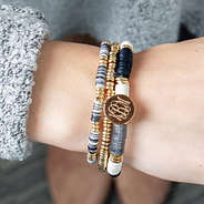 monogrammed beaded bracelets on wrist