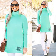 mint turtleneck with white jeans