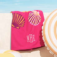 close up of personalized beach towel in fuchsia shells