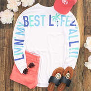 living my best life jersey with coral shorts and hat