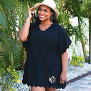 monogrammed bathing suit cover with fedora at beach