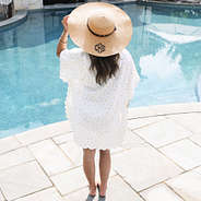 back of monogrammed metallic gold leopard swimsuit cover up