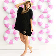 girl in black bathing suit cover over pool rings