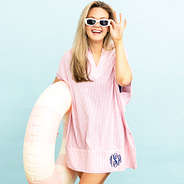 pink seersucker nantucket cover up on emily with pool float