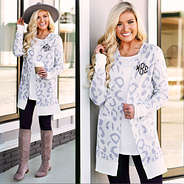 monogrammed white leopard cardigan with boots