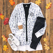 monogrammed leopard cardigan with black shirt and black leggings