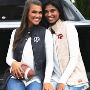 girls wearing texas a&m heathered quilted vests