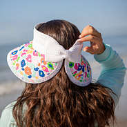 Back of Multi Leopard Straw Visor at beach