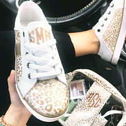 metallic leopard monogrammed sneakers in car