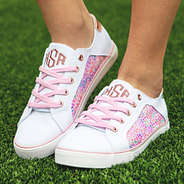 monogrammed watercolor sneakers at angle in grass