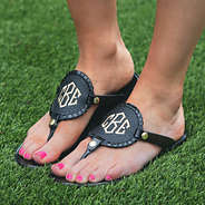monogrammed flip flops side angle on turf